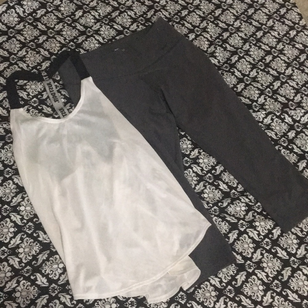 Nike grey Capri. White tank Nike.